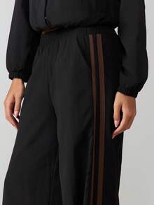 MISSGUIDED Pantalones de chándal de pierna ancha de nailon para mujer con detalle de raya lateral, cintura elástica, ajuste holgado y casual, pantalones de chándal de longitud completa para comodidad diaria - Negro - Ver 5