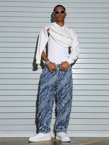 Manfinity EMRG 男士喇叭牛仔裤（带口袋）、时尚提花织造长裤、男士时尚创意流苏牛仔短裤、流苏裤、滴水牛仔裤、堆叠牛仔裤 - 中等水洗藍 - 查看 6