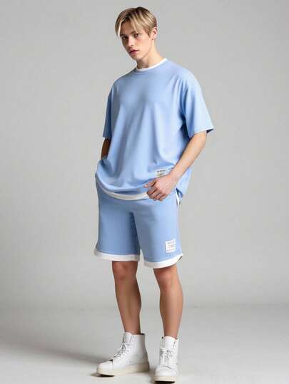 Vacaura 2-delat set för tonårspojkar, vår och sommar, ny ankomst, minimalistiskt, avslappnat set med blått, rundhalsad t-shirt och shorts, lämpligt för sommaren