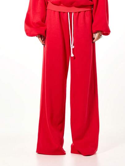 SUMWON WOMEN 宽松阔腿运动裤，配有抽绳腰带和金属孔眼细节，休闲舒适。