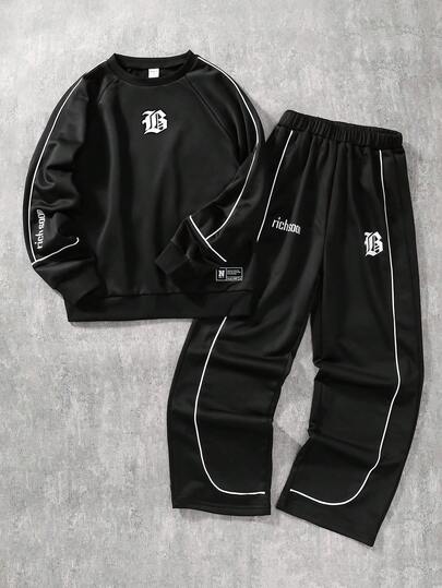 SHEIN Coolqubz Set de 2 piezas de ropa informal de calle para adolescentes varones, sudadera con capucha de corte holgado con estampado de letras y pantalones rectos con diseño de rayas de contraste