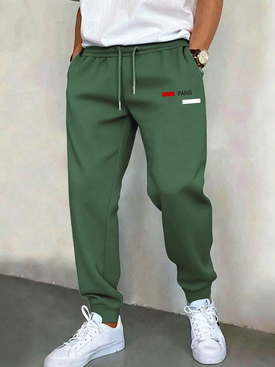 Manfinity Homme 男士休闲日常通勤字母印花抽绳腰斜插口袋慢跑裤 男士设计师运动裤 男士弹力裤 男士慢跑街头风运动裤 街头风长裤 - 綠色 - 查看 1