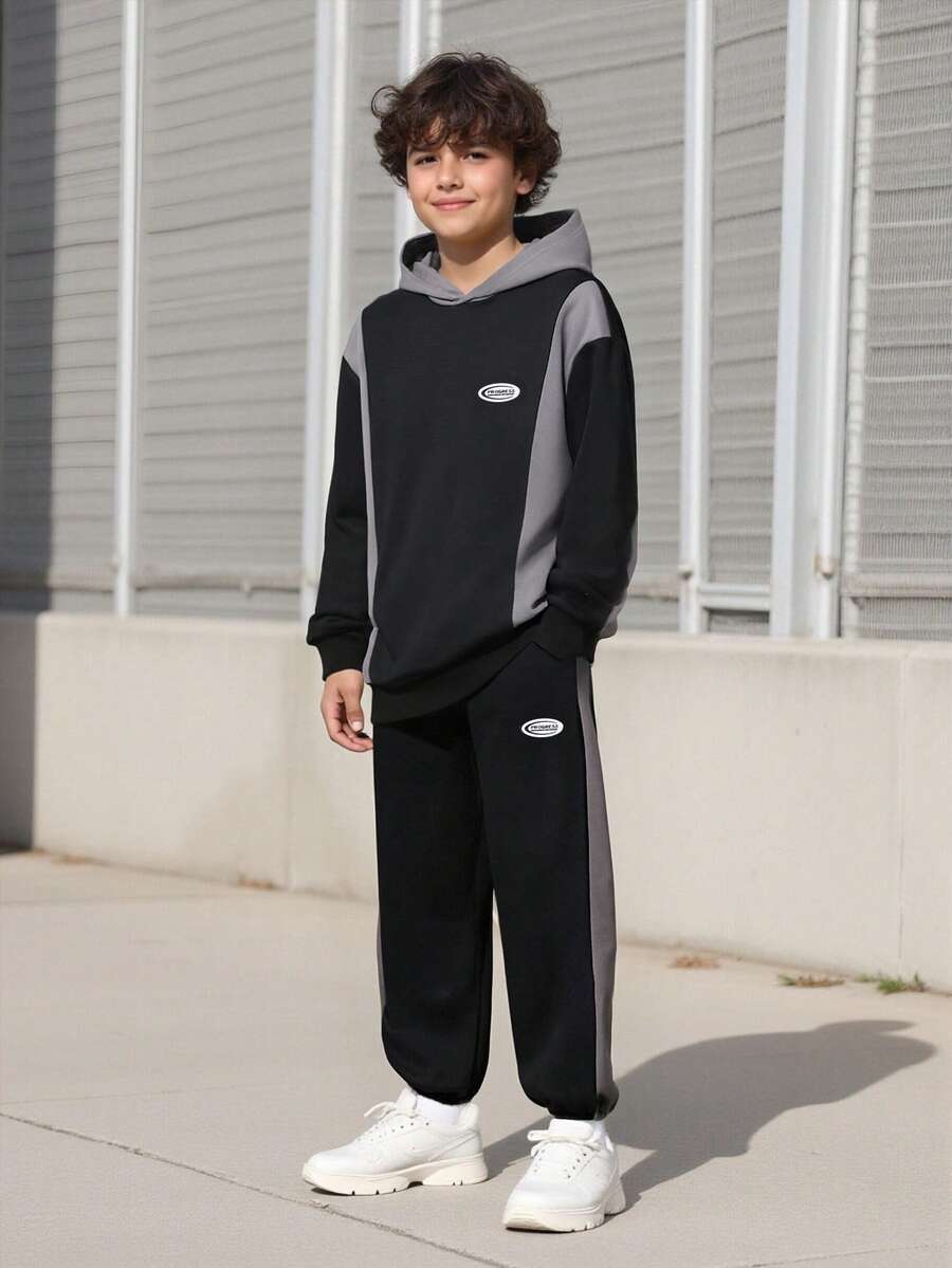 Vacaura 2pcs/Set Tween BoyMinimalist Stylish Patchwork Pullover Sweatshirt Sweatshirt And Patchwork Cuffed Pants, Silhouette, Comfortable Fabric, Suitable For School And Casual Wear, Autumn/Winter - Black - View 1