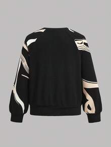 SHEIN Sudadera informal con cuello redondo y mangas raglán con estampado floral y patchwork para niña preadolescente - Negro - Ver 2