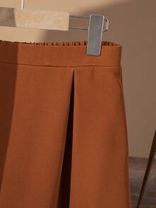 SHEIN Conjunto Elegante com Top de Manga Longa com Babados e Botões na Frente em Cores Contrastantes e Saia Mini Sólida para Adolescentes