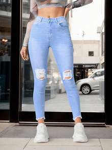 Pantalones vaqueros de mezclilla azul claro con rodillas rasgadas y dobladillo deshilachado - Lavado ligero - Ver 19