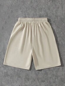 SHEIN Coolqubz Teen Boys' Breathable Mesh Fabric English Text & Basketball Design Loose Fit Casual Sports Shorts