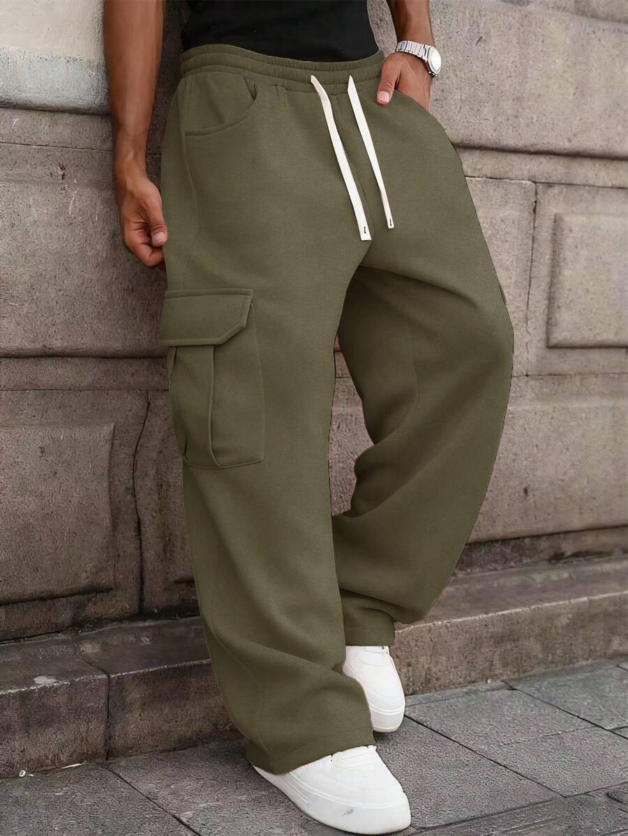 Manfinity EMRG 男士街头风多口袋实用运动裤，百搭实用，适合街头穿搭、日常休闲、周末郊游、音乐节、社交聚会等各种场合。这款裤子是男士衣橱中必备的百搭单品，也是送给男友或老公的绝佳礼物。 - 軍綠色 - 查看 1