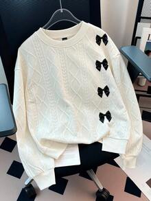 GlowEve Blusa feminina casual e moderna, cor sólida, texturizada, com gola redonda, ombros caídos, mangas compridas, modelagem solta, barra com fenda e detalhe de laço.