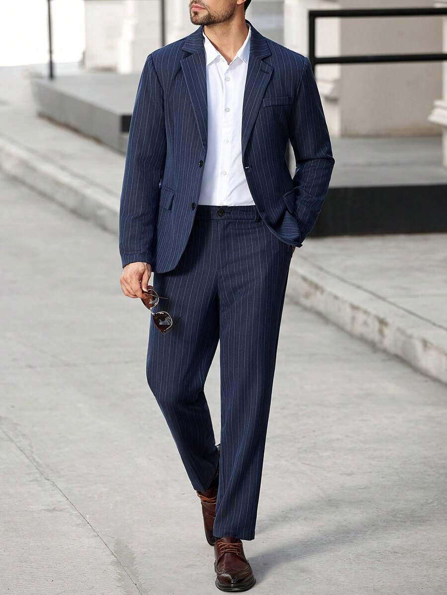 Manfinity Bizformal 男士商务休闲单排扣西装套装,包含外套和裤子,翻领设计更添时尚感和层次感,适合日常通勤、商务场合、派对和宴会穿着。这套西装是男士衣橱中不可或缺的百搭单品,也是送给男友或丈夫的绝佳礼物,尽显老派绅士风范。 - 藍色 - 查看 1