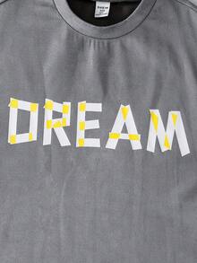 SHEIN Explorewe 两件套男童灰色宽松圆领短袖DREAM字母印花上衣搭配黑色阔腿裤，裤子采用松紧腰设计，裤腿有层次感，休闲街头风，适合夏季、街头、返校、日常穿着。 - 彩色 - 查看 7