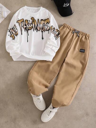 SHEIN 2pcs/Set Fashion White Hoodie Paired With Olive Green Pants, Stylish Outfit For Tween Boy The Hoodie Features Green Placement Print, Soft & Comfortable Fabric, Suitable For Spring/Autumn Wear, Versatile For School, Outings And More.,Unisex