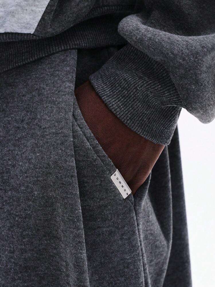 Pantaloni della tuta mélange con tasche laterali