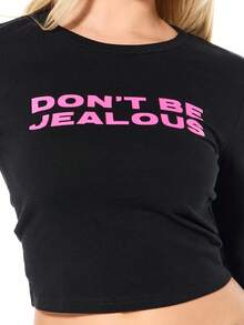 SUMWON WOMEN Don't Be Jealous Long Sleeve Cropped Baby Tee With Pink Graphic Text Print Crew Neck Fitted Style - Black - View 6