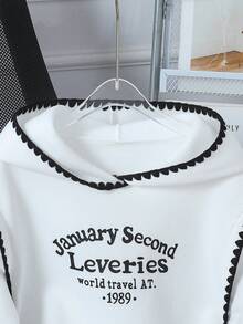 SHEIN Este suéter con capucha blanco de manga larga, elegante y casual para niñas, presenta una estampa en inglés en el pecho, una silueta cómoda y puños y dobladillo acanalados cómodos. Los hombros y la capucha tienen un diseño de carcasa de punto negro único. Perfecto para otoño e invierno, actividades al aire libre, escuela, viajes, fiestas: ¡un suéter imprescindible! - Blanco - Ver 7