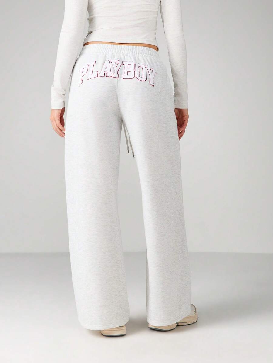 Missguided x Playboy Quần chạy bộ ống rộng màu xám pha có dây rút ở eo và họa tiết chữ màu hồng, thích hợp mặc thường ngày và thoải mái khi đi chơi - Màu Xám nhạt - Xem 1