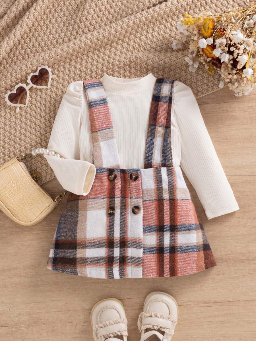 SHEIN 2pcs Baby Girl Casual Minimalist Fashion Apricot Ribbed Long Sleeve Top Paired With Burgundy Plaid Suspender Skirt Set, Suitable For Street & School Wear, Spring/Autumn - Apricot - View 1