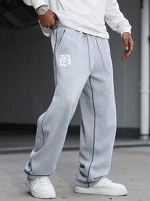 Manfinity Hypemode Quần nỉ nam in chữ, cạp chun, túi, ống rộng, dáng suông, kiểu dáng rộng rãi, quần nỉ thể thao nam, quần nỉ rộng ống cho nam màu xám. - Màu Xám nhạt - Xem 3