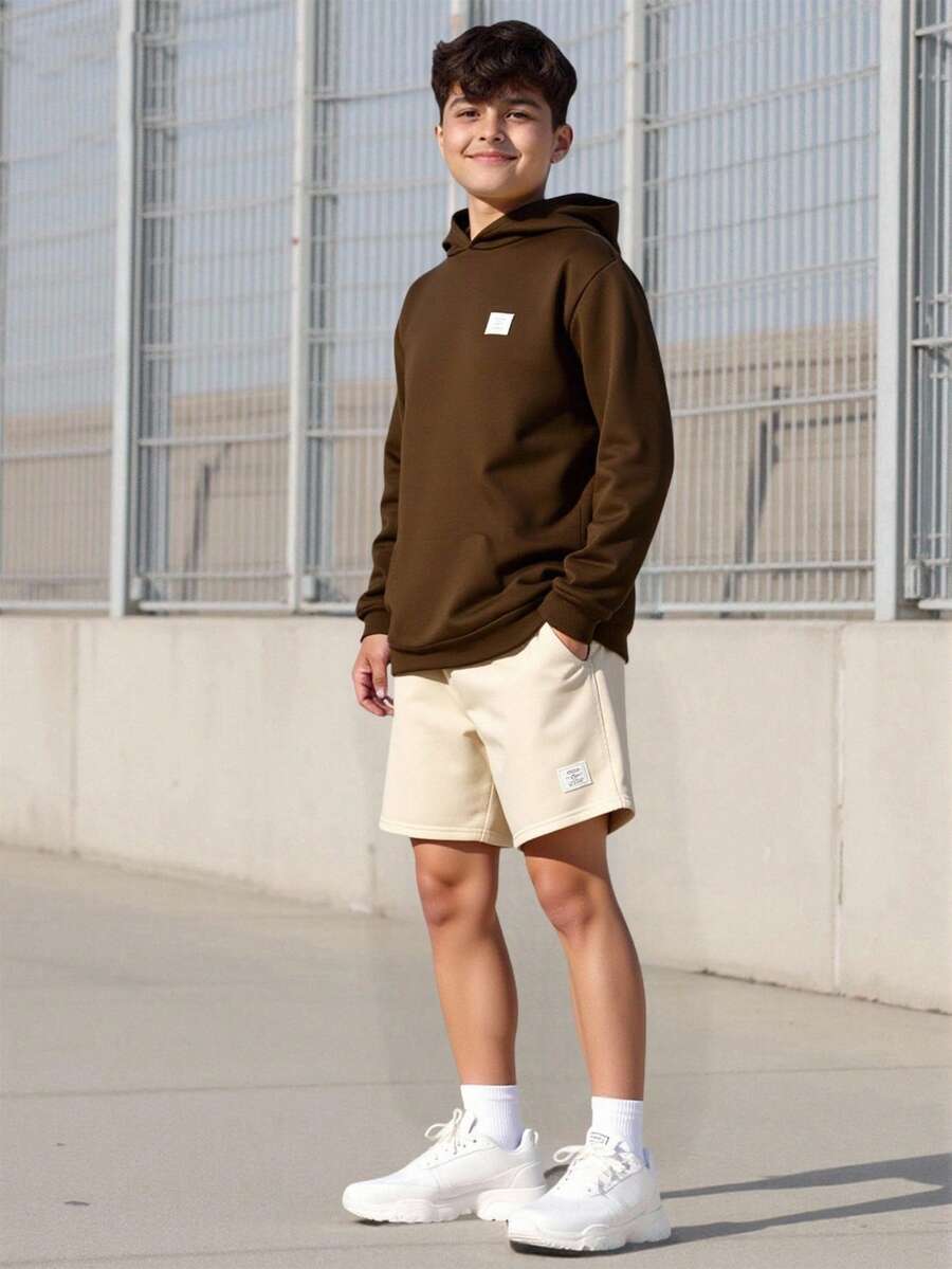 Vacaura 2 件青少年男孩休闲纯色连帽运动衫和运动短裤套装，简约风格，上衣和裤子上饰有编织标签，舒适，适合上学和百搭日常穿着，秋冬新品