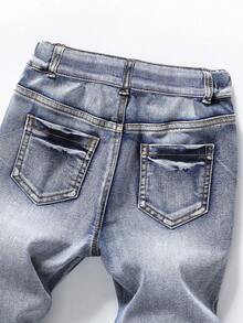 SHEIN Coolqubz 1pc Tween Boys Printed Stretch Denim Jeans, New Casual Street Style For School, Travel, Outdoor Wear! Classic Washed Blue Denim Fabric, Hand-Rubbed Craft + Letter Print Design, Personalized And Fashion, Regular Waistband + Button Fly, Easy To Put On And Take Off,Unisex - Dark Wash - View 5