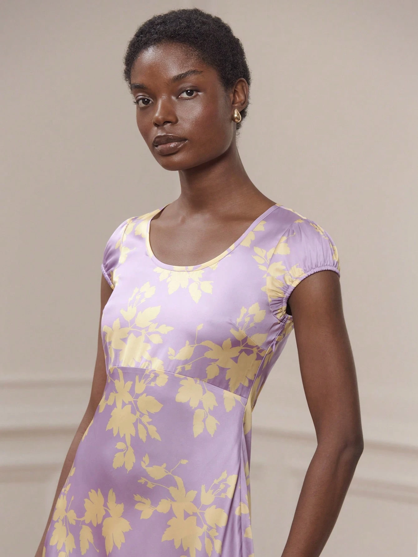 Long Satin Dress With Yellow Floral Print On A Lilac Background Featuring Short Sleeves And A Round Neckline Office Outfits Spring New Year Dress