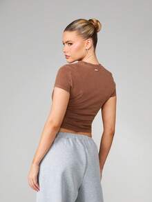 Missguided x Playboy Washed Baby Tee With Wyoming Chest Print Short Sleeve Crew Neck Cotton Blend Graphic Top - Brown - View 2