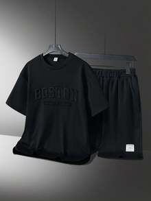 Vacaura 2 件青少年男孩休闲套装，时尚压花英文图案圆领套头 T 恤，弧形侧边设计，纯色短裤，简约编织标签和弧形下摆，适合夏季和秋季 - 黑色 - 查看 3