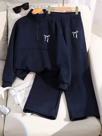 SHEIN 两件套少女休闲套装，包括一件拉链高领长袖卫衣和宽松阔腿裤，适合日常穿着和运动。