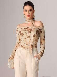 Modelyn Áo thun lưới mỏng dệt kim in ruy băng gợi cảm mùa thu - Màu be - Xem 4