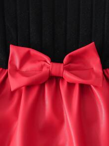 女童双面珊瑚绒无袖背心外套，搭配黑色罗纹针织12*4纹理半身连衣裙，腰间饰有红色皮革蝴蝶结，并配以红色皮革贝雷帽。女童咖啡色针织圆领长袖上衣，饰有破洞拼接和豹纹蝴蝶结，搭配豹纹针织短裤，两件套休闲装，适合户外旅行、派对等场合。 - 米色 - 查看 6