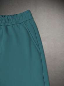 Manfinity Hypemode Pantalones de chándal con cordón en la cintura para hombre de corte holgado - Verde Oscuro - Ver 4