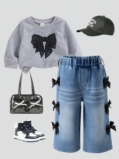 SHEIN Playful Pals 两件套女婴时尚休闲街头风套装，包括一件灰色圆领长袖卫衣（饰有黑色蝴蝶结印花）和一条蓝色阔腿牛仔裤（饰有黑色丝带蝴蝶结），适合上学和日常穿着，春秋季皆宜。