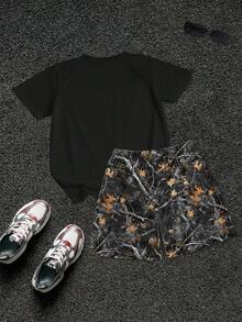 SHEIN Coolqubz Bộ 2 món áo thun tay ngắn in hình nhân vật dành cho bé trai tuổi mới lớn và quần short thường ngày - màu đen - Xem 2