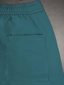 Manfinity Hypemode Pantalones de chándal con cordón en la cintura para hombre de corte holgado - Verde Oscuro - Ver 5