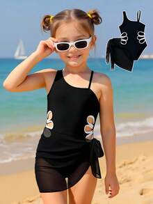 这款单肩无袖泳衣专为小女孩设计，侧边镂空，搭配网纱裙摆。时尚、休闲又不失优雅，是游泳、度假和夏季穿着的理想之选。 - 黑色 - 查看 2