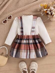 SHEIN 2pcs Baby Girl Casual Minimalist Fashion Apricot Ribbed Long Sleeve Top Paired With Burgundy Plaid Suspender Skirt Set, Suitable For Street & School Wear, Spring/Autumn - Apricot - View 2