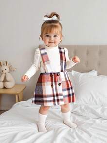 SHEIN 2pcs Baby Girl Casual Minimalist Fashion Apricot Ribbed Long Sleeve Top Paired With Burgundy Plaid Suspender Skirt Set, Suitable For Street & School Wear, Spring/Autumn - Apricot - View 3