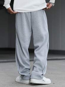 Manfinity Hypemode Quần nỉ nam in chữ, cạp chun, túi, ống rộng, dáng suông, kiểu dáng rộng rãi, quần nỉ thể thao nam, quần nỉ rộng ống cho nam màu xám. - Màu Xám nhạt - Xem 2