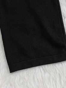 Sparklyn 少女黑色毛衣套装 - 甜美风格，饰有厚重荷叶边领、宽翻领和3D珍珠点缀。宽松百搭的优雅针织两件套（长袖开衫+长裤），设计温柔时尚。适合日常穿着、节日庆典、外出、旅行、度假、居家穿着以及返校造型，细节丰富，百搭实用。 - 黑色 - 查看 8