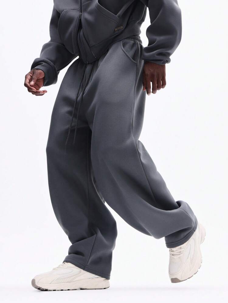 Pantalones deportivos con cordón ajustable y bolsillos laterales