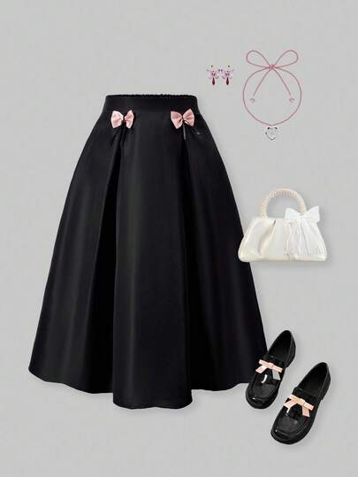 SHEIN ChillGRL Falda negra con lazo rosa para niña preadolescente