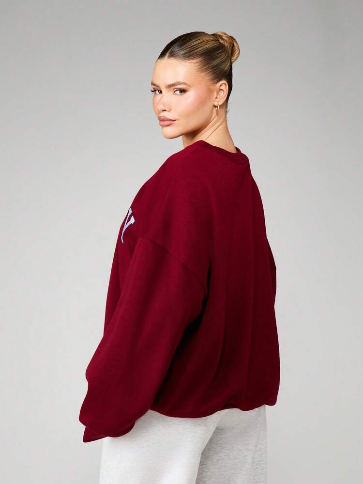 Missguided x Playboy Oversized Crew Neck Long Sleeve Graphic Sweatshirt With Large Front Text Print For Casual Comfort Fall Winter Layering Pullover