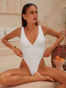 Oceva 女士纯色连体泳衣，适合海滩/度假村穿着。女士度假沙滩撞色连体泳衣，适合假日、约会、下午茶、西式、邮轮、海滩、海岛、公路旅行、四季皆宜、音乐节、波西米亚风度假、凉爽秋季、西部波西米亚风。优雅女士上衣，饰有金属珍珠饰边和撞色棕色泳衣。女士娇小泳衣，带聚拢文胸，米色泳衣，棕色/白色。 - 彩色 - 查看 4