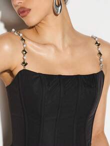 KIZN Sleeveless Corset Top With Decorative Chain Straps And Fitted Silhouette For Evening Parties Night And Special Occasions - Black - View 3