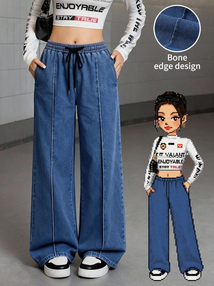 SHEIN Jeans rectos de mezclilla negra con parches para adolescentes, moda casual de campus recomendada para otoño/invierno. Tela negra clásica y cómoda, con panel frontal de parches, cintura elástica con cordón, fácil de poner y quitar, silueta recta holgada que estiliza las piernas, adecuado para diversos tipos de Body. Versátil y resistente a la suciedad, perfecto para salidas, ocio en el campus o uso diario, creando un aspecto juvenil y enérgico. - Azul lavado oscuro - Ver 1