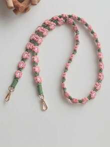 1个波西米亚风手工编织小雏菊斜挎包，配有手机挂绳、钥匙链，是送给母亲、家人、朋友的生日、节日礼物，也可作手机挂饰或手机链。