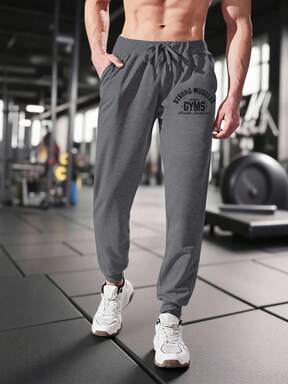 Manfinity Sport Corelite بنطلون طويل كاجوال للرجال مطبوع مع جيوب وسحاب