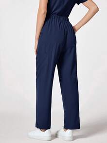 TaskEZ 1pc Solid Color Minimalist Elastic Waist Diagonal Pocket Scrub Pants Scrub Uniform Bottoms - Navy Blue - View 2