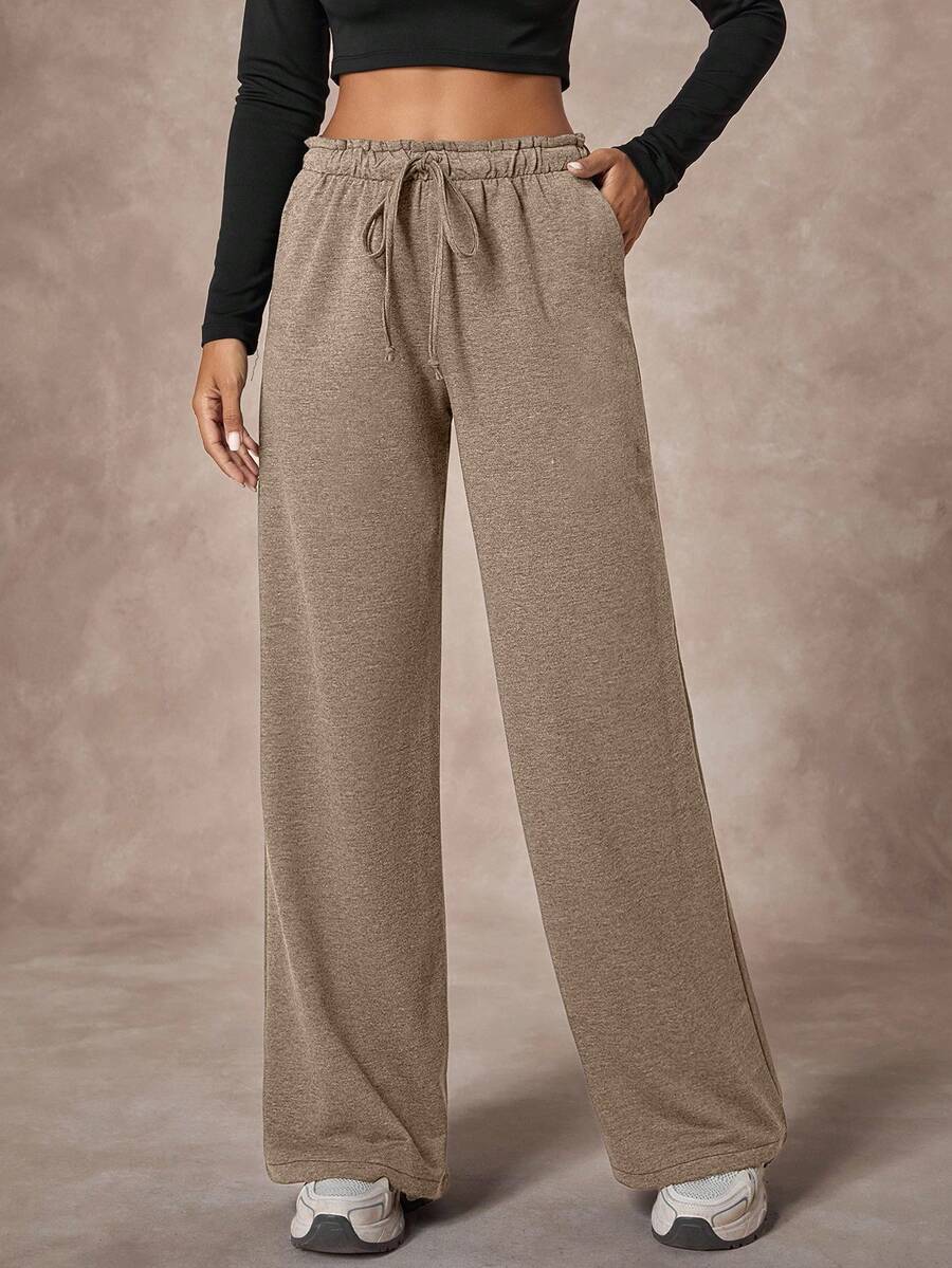 Enfärgade, resårmidjade, dragsko och vida ben för kvinnor, casual träningsbyxor - Beige - Visa 1