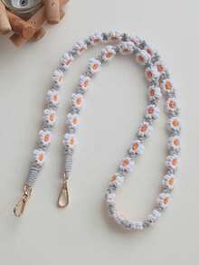 1个波西米亚风手工编织小雏菊斜挎包，配有手机挂绳、钥匙链，是送给母亲、家人、朋友的生日、节日礼物，也可作手机挂饰或手机链。